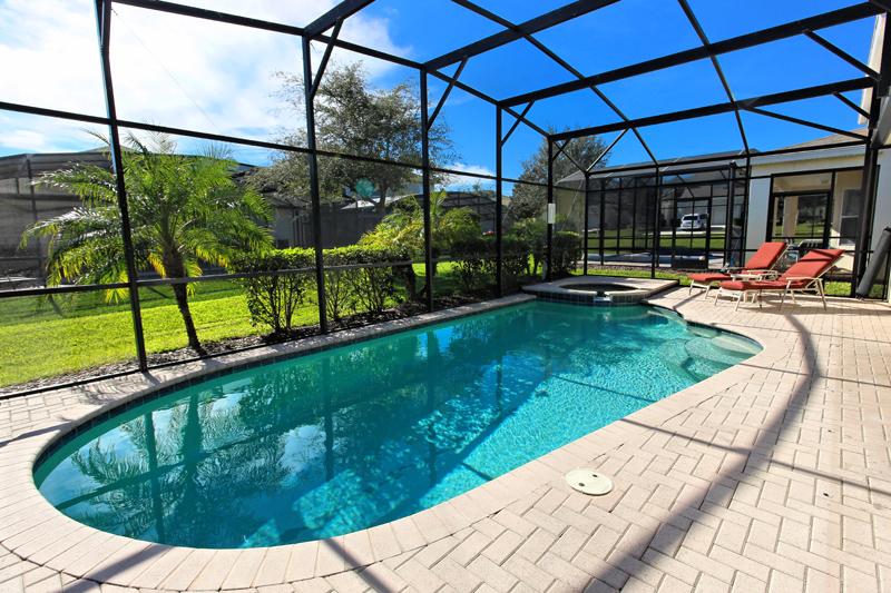 private pool and patio area with sun in distance